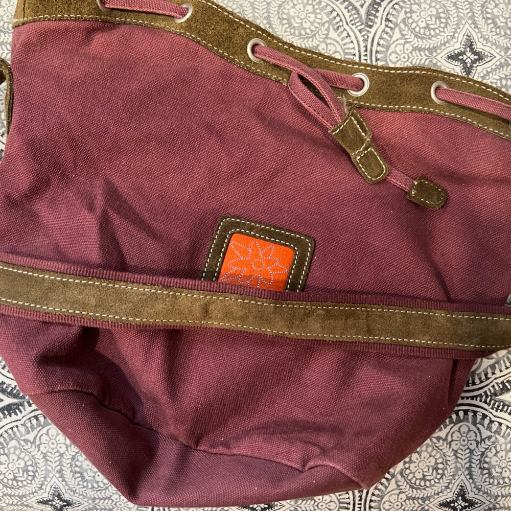 Sherpani fabric bucket crossbody bag in wine aubergine color long strap GUC